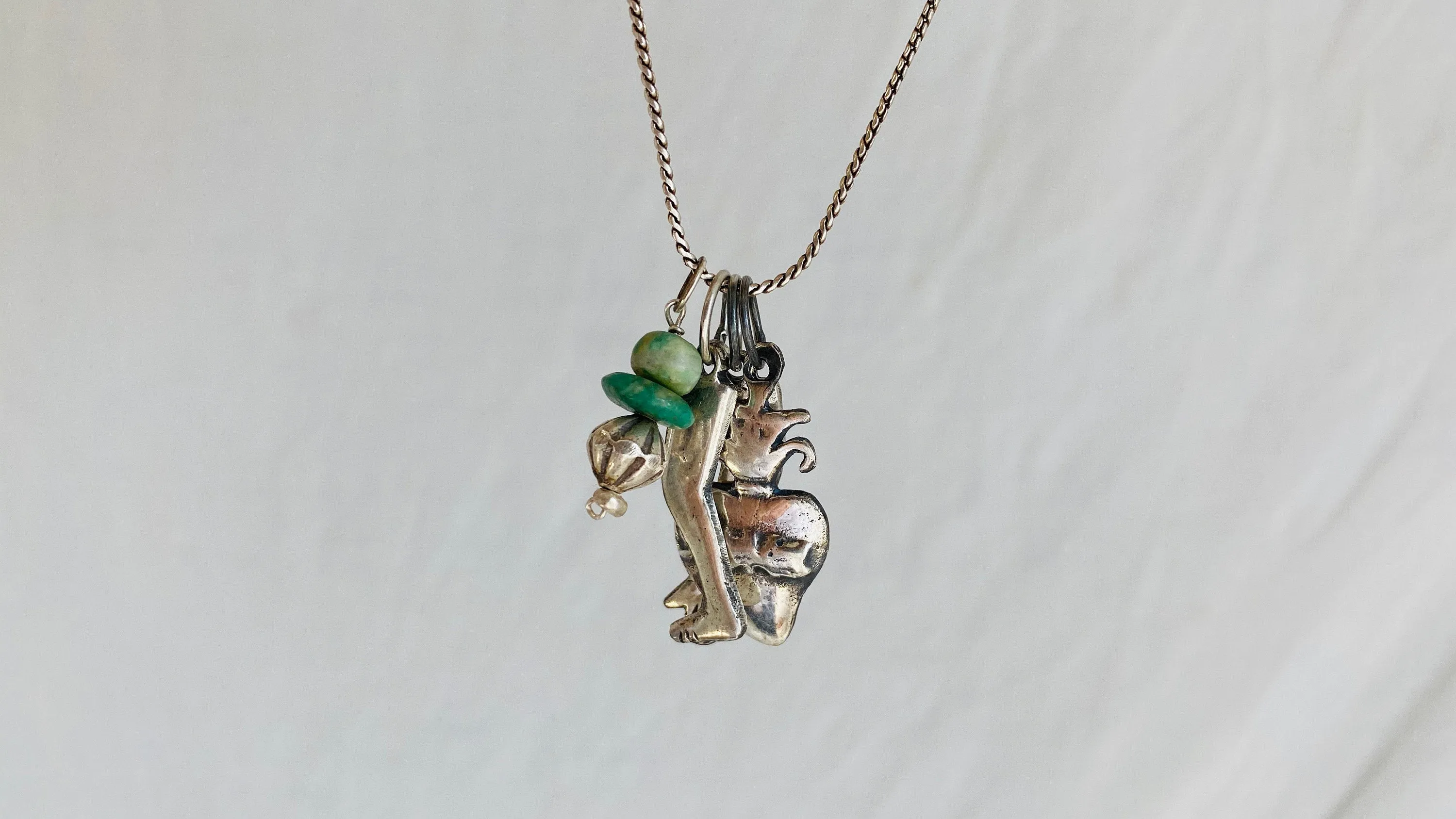 Milagro Pendants Necklace. Mexico. Sterling Silver and Jade.